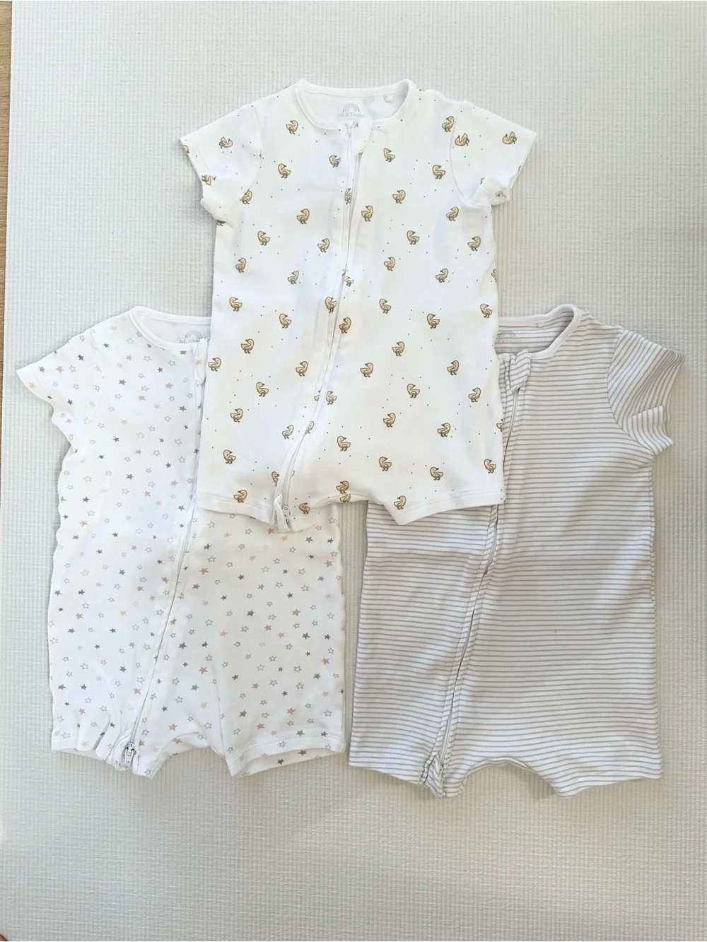 A set of 3 shortie rompers